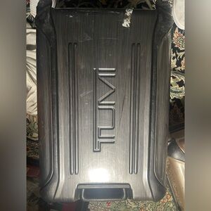 TUMI Metallic Gray Suitcase